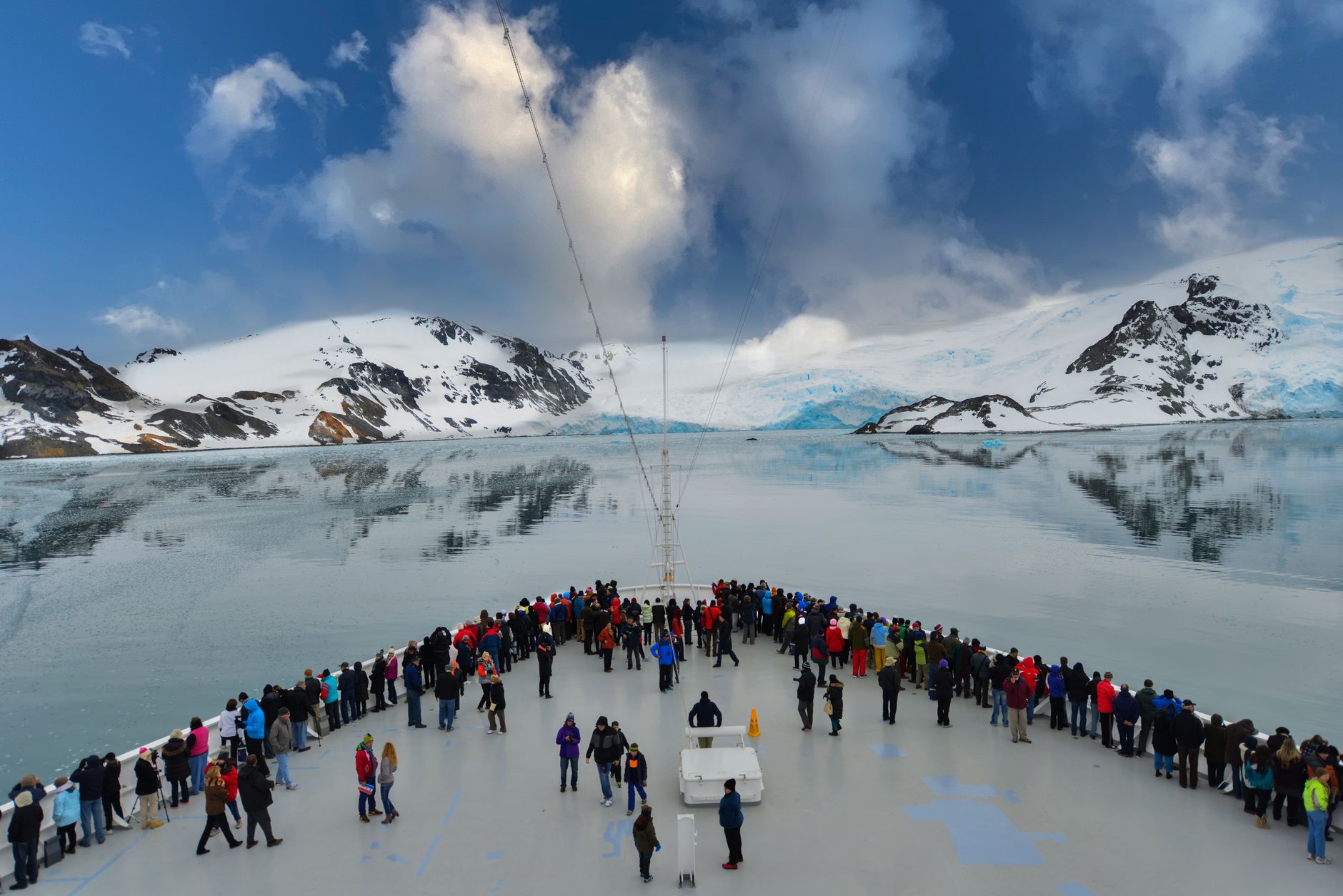 Seabourn luxury expedition ship navigating scenic polar glaciers and fjords