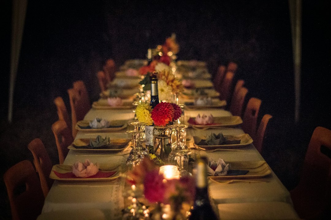 Corporate executive leadership team dining and collaborating on an elite offsite retreat