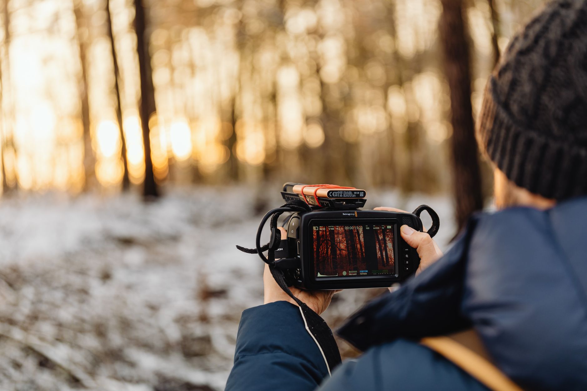 Luxury travel advisor filming a high-intent resort review with professional camera and microphone